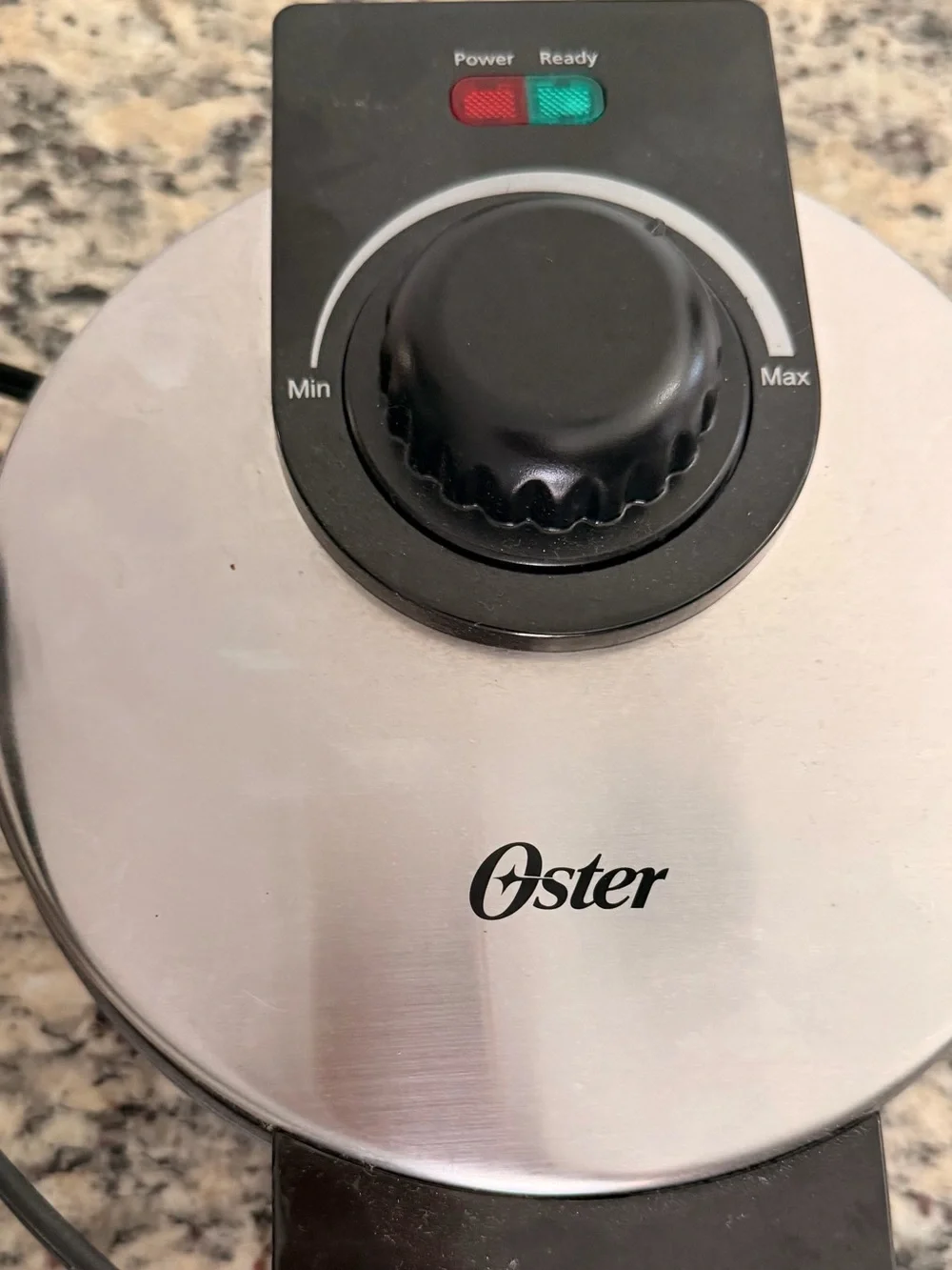 Oster Black Round 4-Section Nonstick Waffle Maker